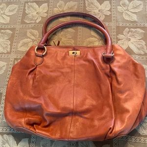 Jcrew luggage color soft leather bag. Gently worn. Excellent condition few